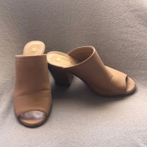 Tan peep toe heeled slides